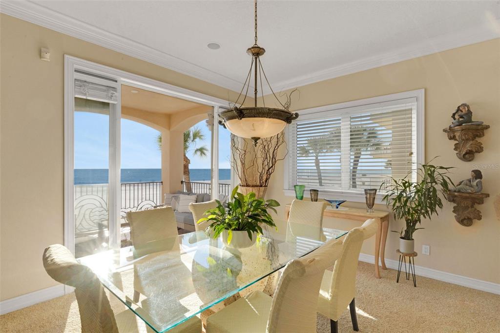 13423 Gulf Lane Madeira Beach, FL 33708 - Photo 12 of 71 a dining room with furniture potted plants