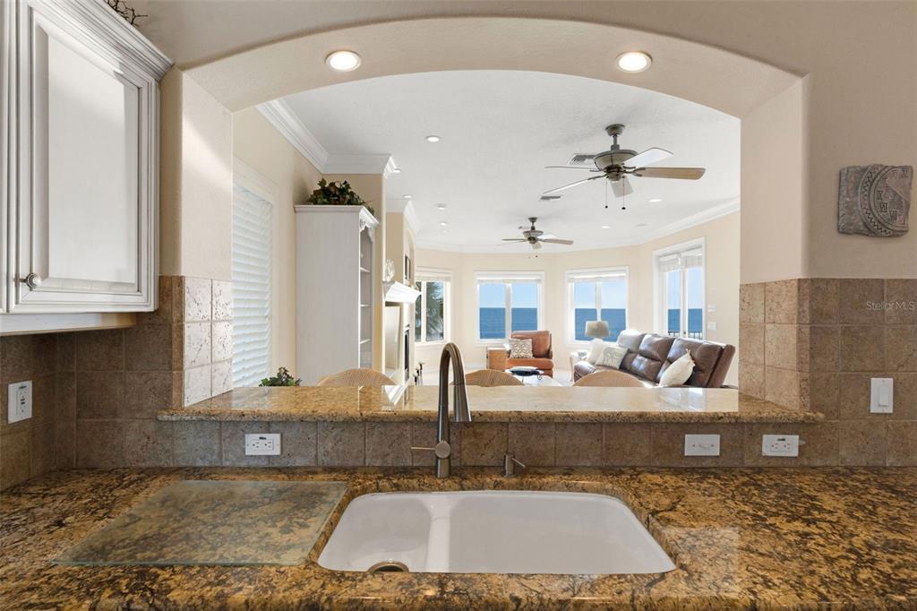13423 Gulf Lane Madeira Beach, FL 33708 - Photo 15 of 71 a large bathroom with a tub sink and mirror