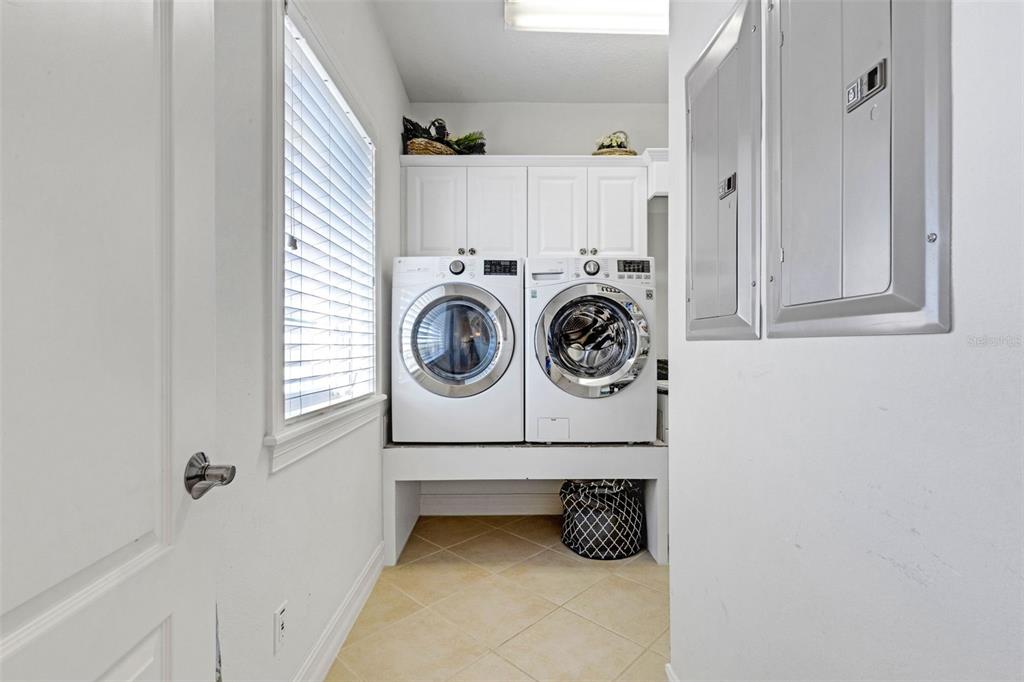 13423 Gulf Lane Madeira Beach, FL 33708 - Photo 57 of 71 a utility room with dryer and washer
