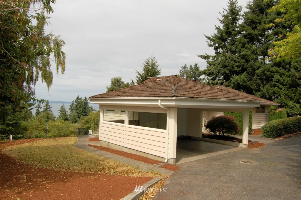 504 Briar Road Bellingham, WA 98225 - Photo 2 of 25 a front view of a house with a yard and garage
