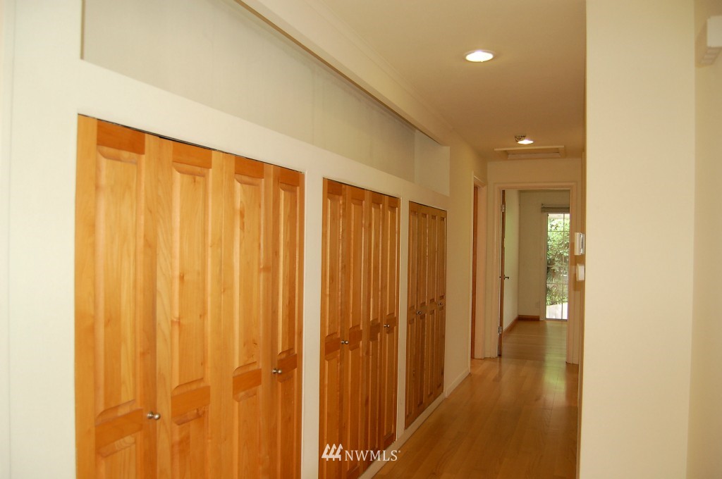 504 Briar Road Bellingham, WA 98225 - Photo 17 of 25 a view of a hallway with wooden floor