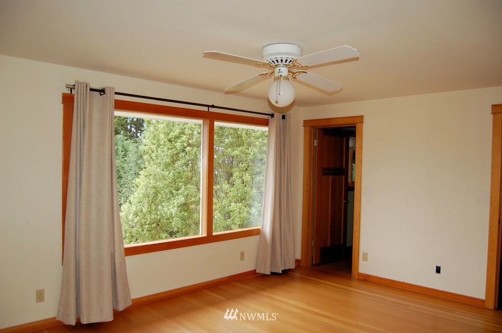 504 Briar Road Bellingham, WA 98225 - Photo 18 of 25 a view of an empty room with window chandelier fan