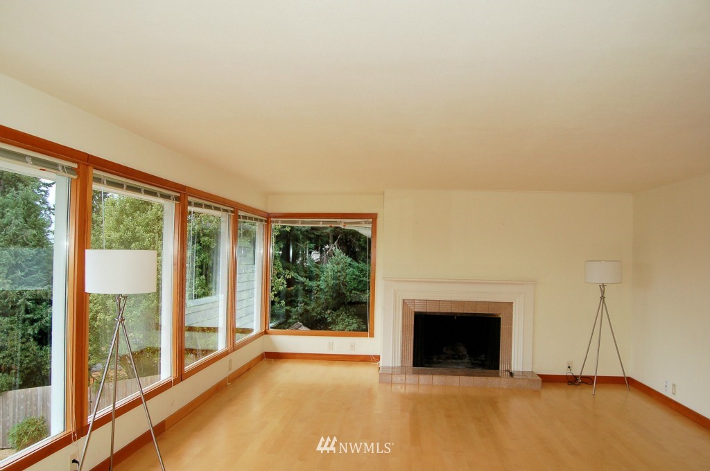 504 Briar Road Bellingham, WA 98225 - Photo 9 of 25 a view of an empty room with a fireplace