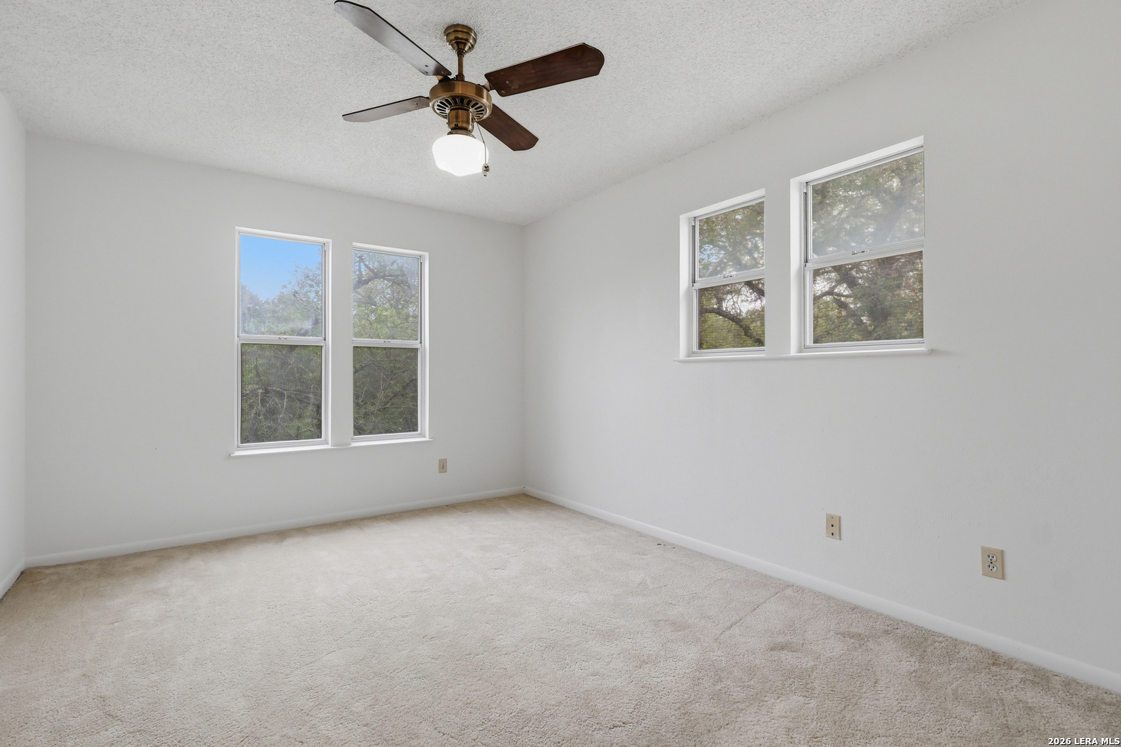 261 Fawn Lane Spring Branch, TX 78070 - Photo 24 of 44 a view of an empty room with a window