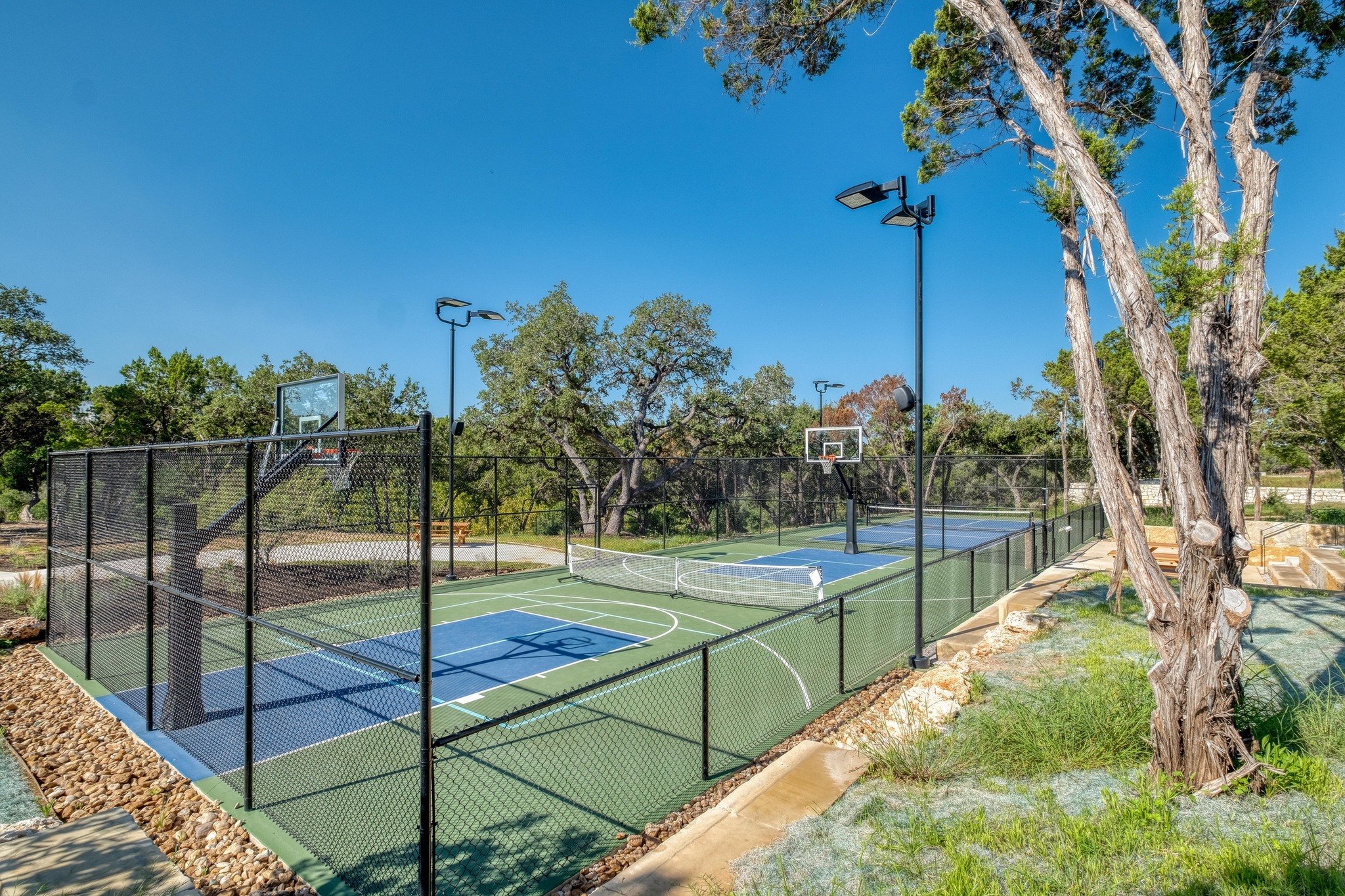 1204 Addison Lane Georgetown, TX 78628 - Photo 26 of 35 Stay active with professional-grade sports facilities, including illuminated basketball and tennis/pickleball courts.