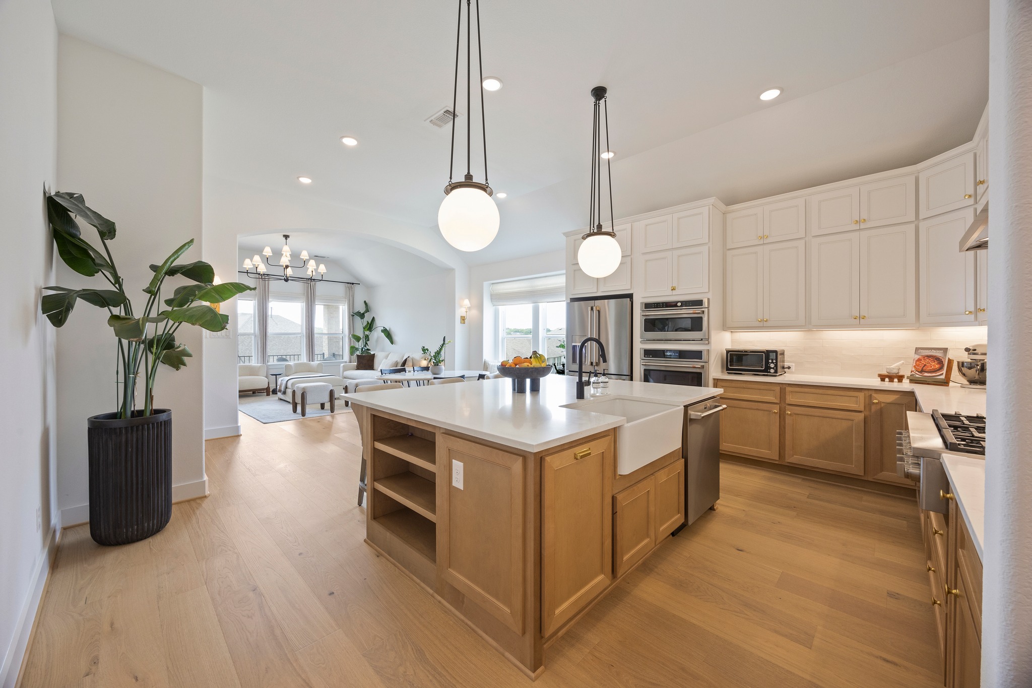 1204 Addison Lane Georgetown, TX 78628 - Photo 35 of 35 As you step inside you are immediately greeted with a bright open floor plan and wide plank flooring that runs throughout the entire home.