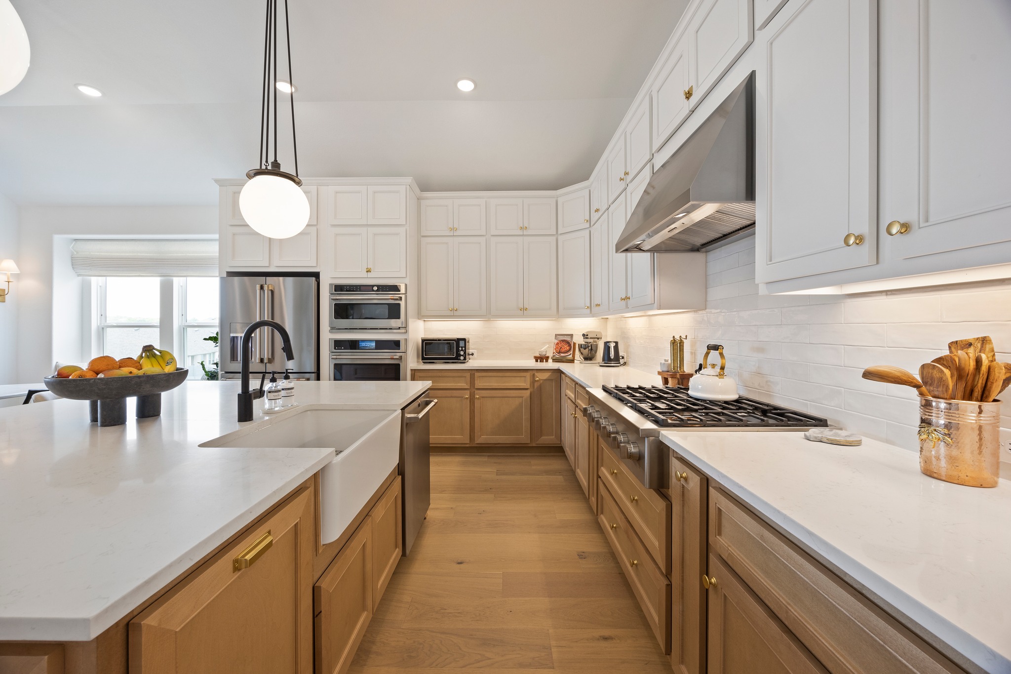 1204 Addison Lane Georgetown, TX 78628 - Photo 5 of 35 GE Cafe appliances include a built in oven, microwave, dishwasher and a sleek gas cooktop.