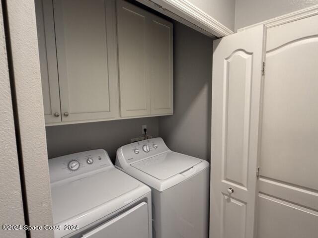 917 Ocaso Lane Rockledge, FL 32955 - Photo 13 of 22 a utility room with dryer and washer