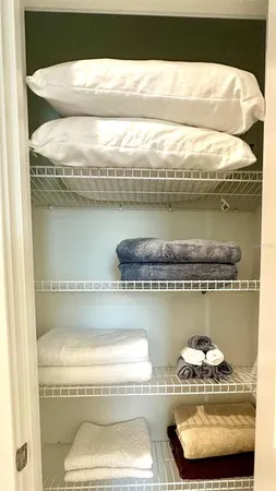 a picture of a fireplace with glass vase