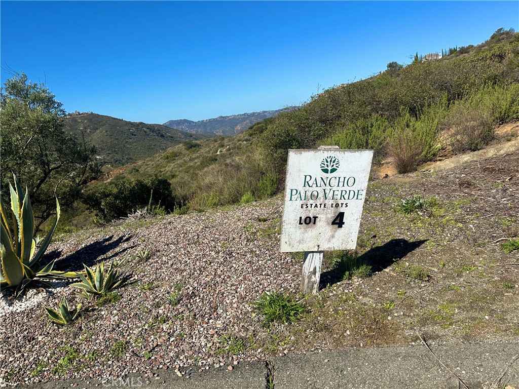 2005 Corte Asoleado Alpine, CA 91901 - Photo 3 of 22 a view of a sign in a garden