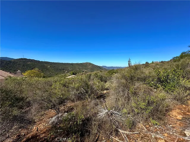 a view of mountain view with mountains in the background