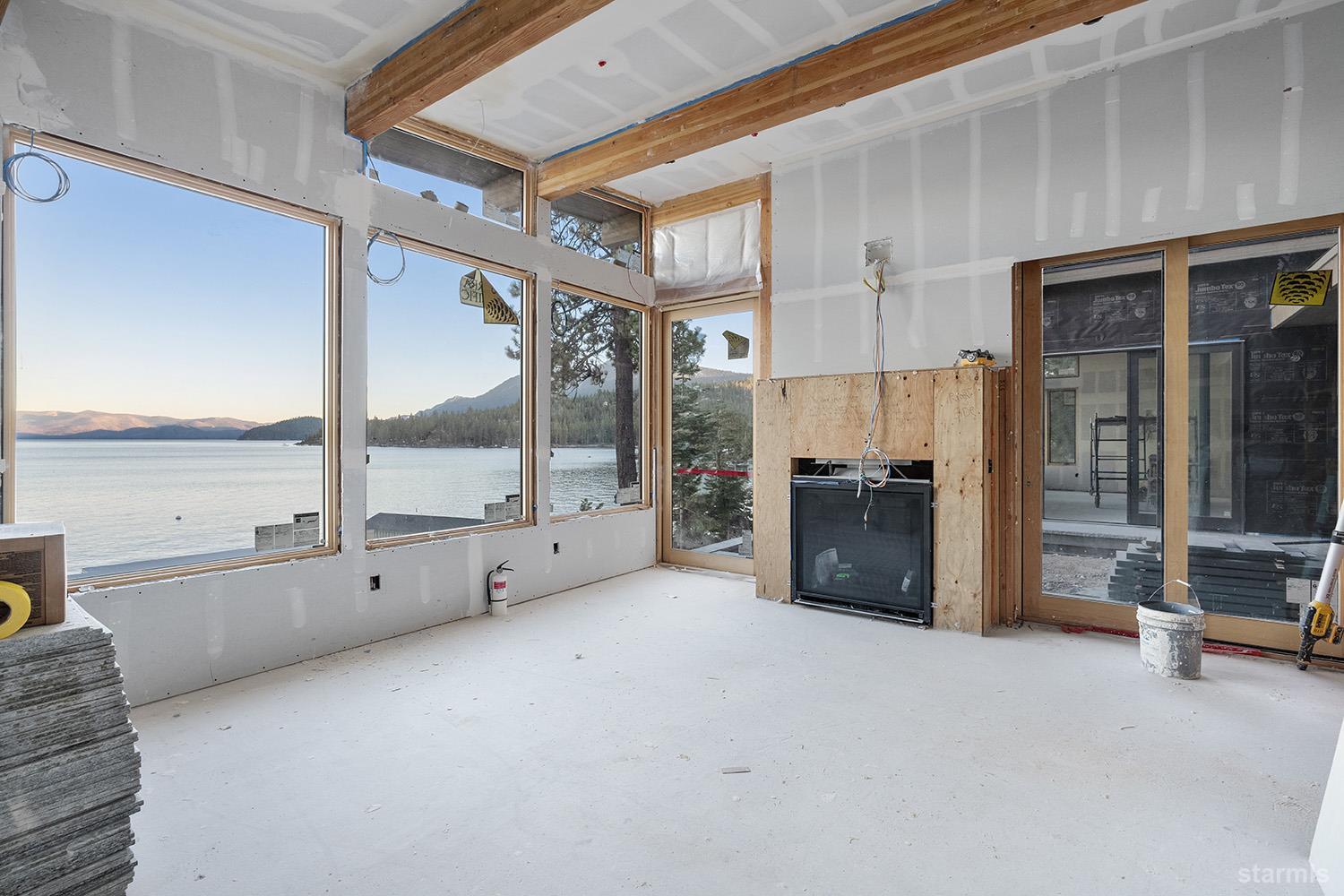 255 Drum Road Meeks Bay, CA 96142 - Photo 11 of 19 a large room with closet and windows