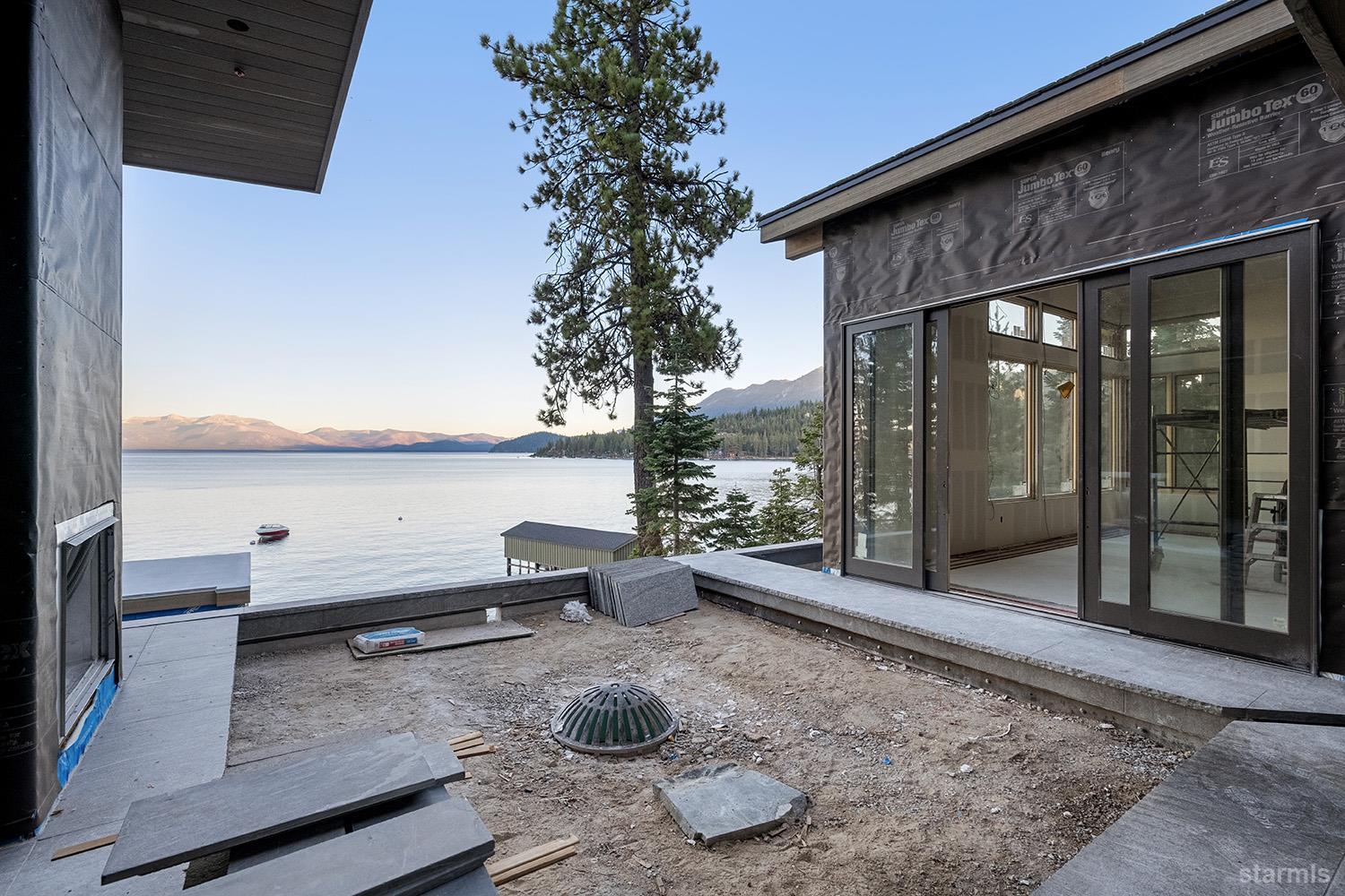 255 Drum Road Meeks Bay, CA 96142 - Photo 14 of 19 a view of a terrace with wooden floor and roof