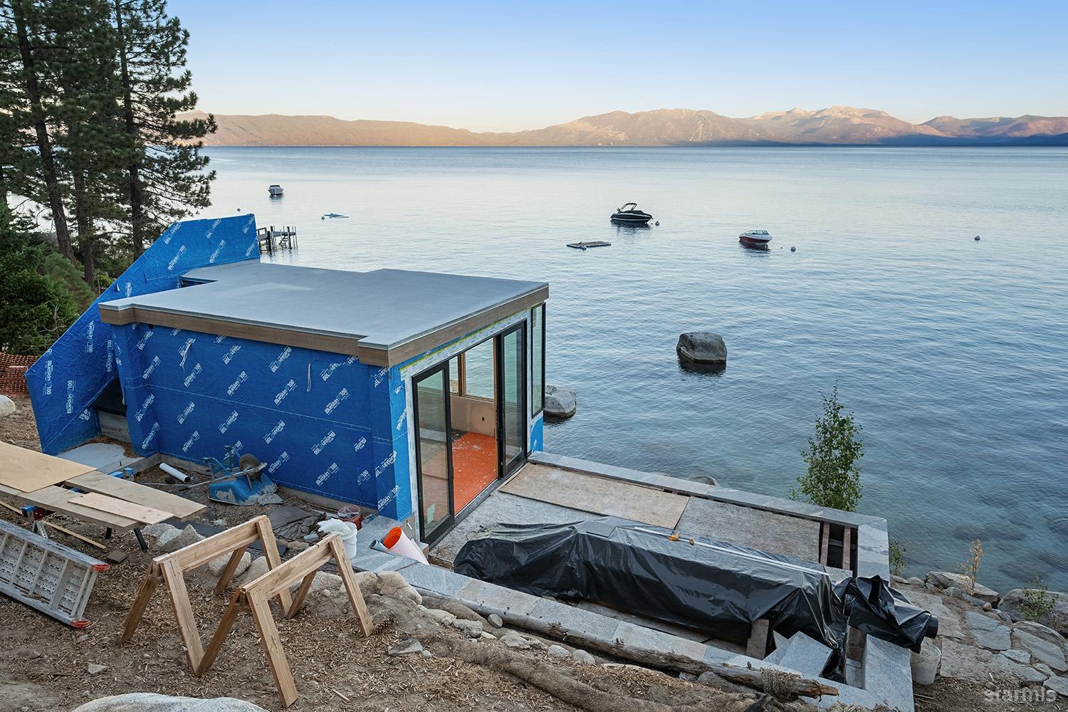 255 Drum Road Meeks Bay, CA 96142 - Photo 17 of 19 a terrace of a house with outdoor seating