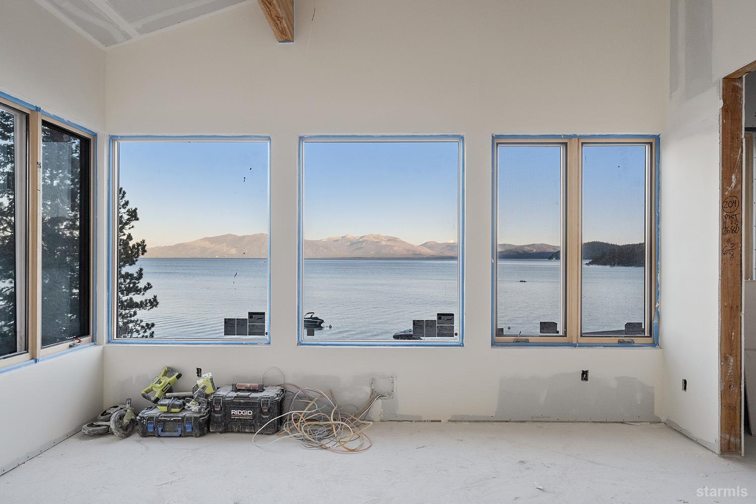 255 Drum Road Meeks Bay, CA 96142 - Photo 10 of 19 a view of room with furniture and windows