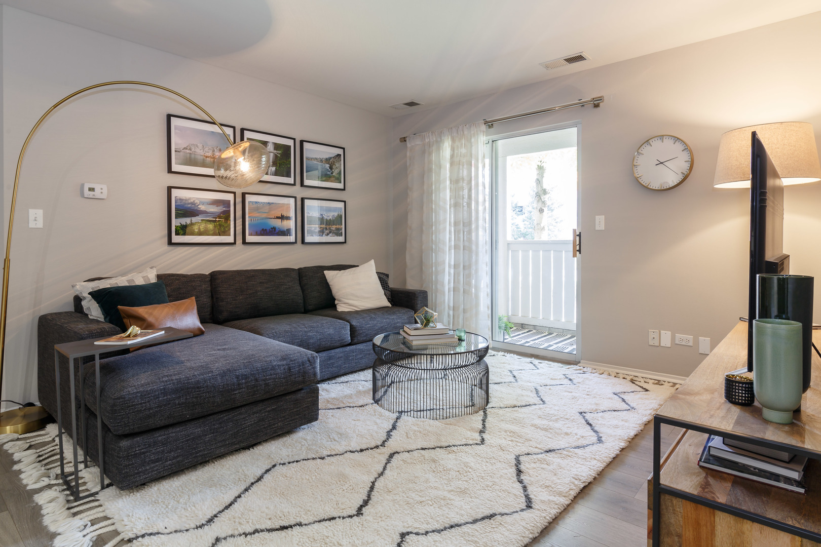 93 Aster Drive, Unit 3423 Schaumburg, IL 60173 - Photo 14 of 26 a living room with furniture and wooden floor