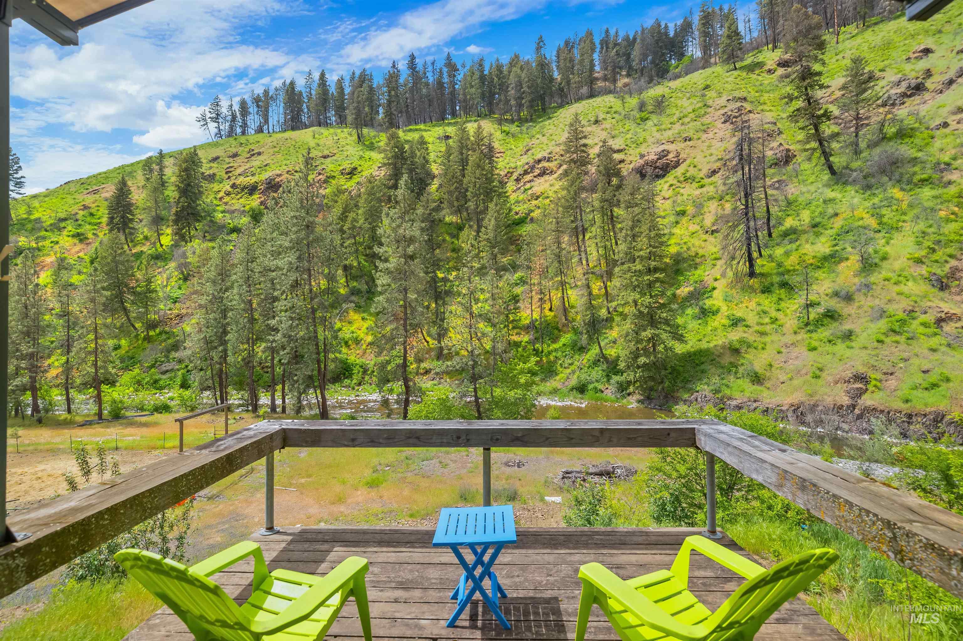 1314 Cedar Ridge Road Kendrick, ID 83537 - Photo 37 of 50 Expansive outdoor deck with wood flooring and natural wood railings