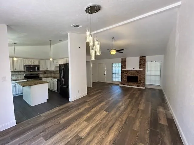 a view of a livingroom with a fireplace