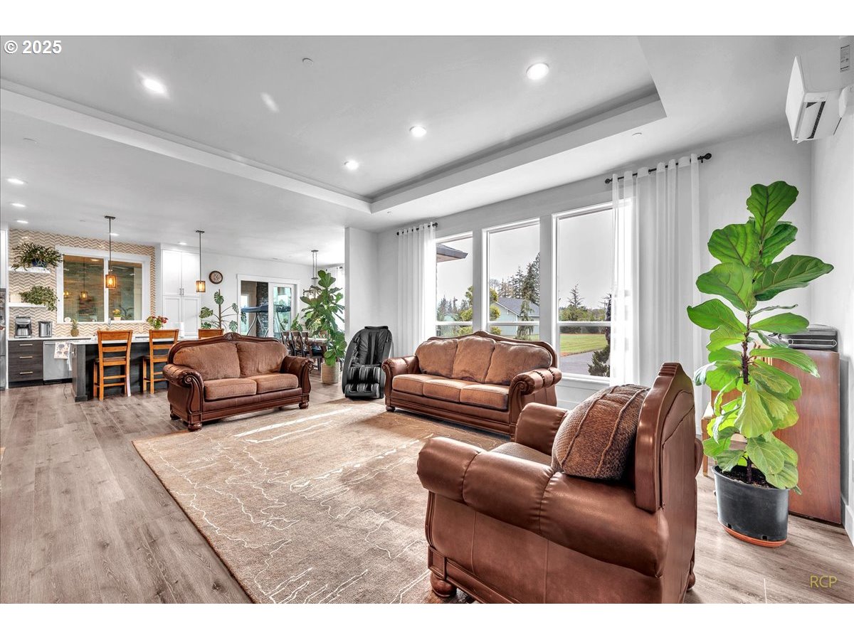 31001 Northwest 51st Avenue Ridgefield, WA 98642 - Photo 36 of 48 a living room with furniture and a large window