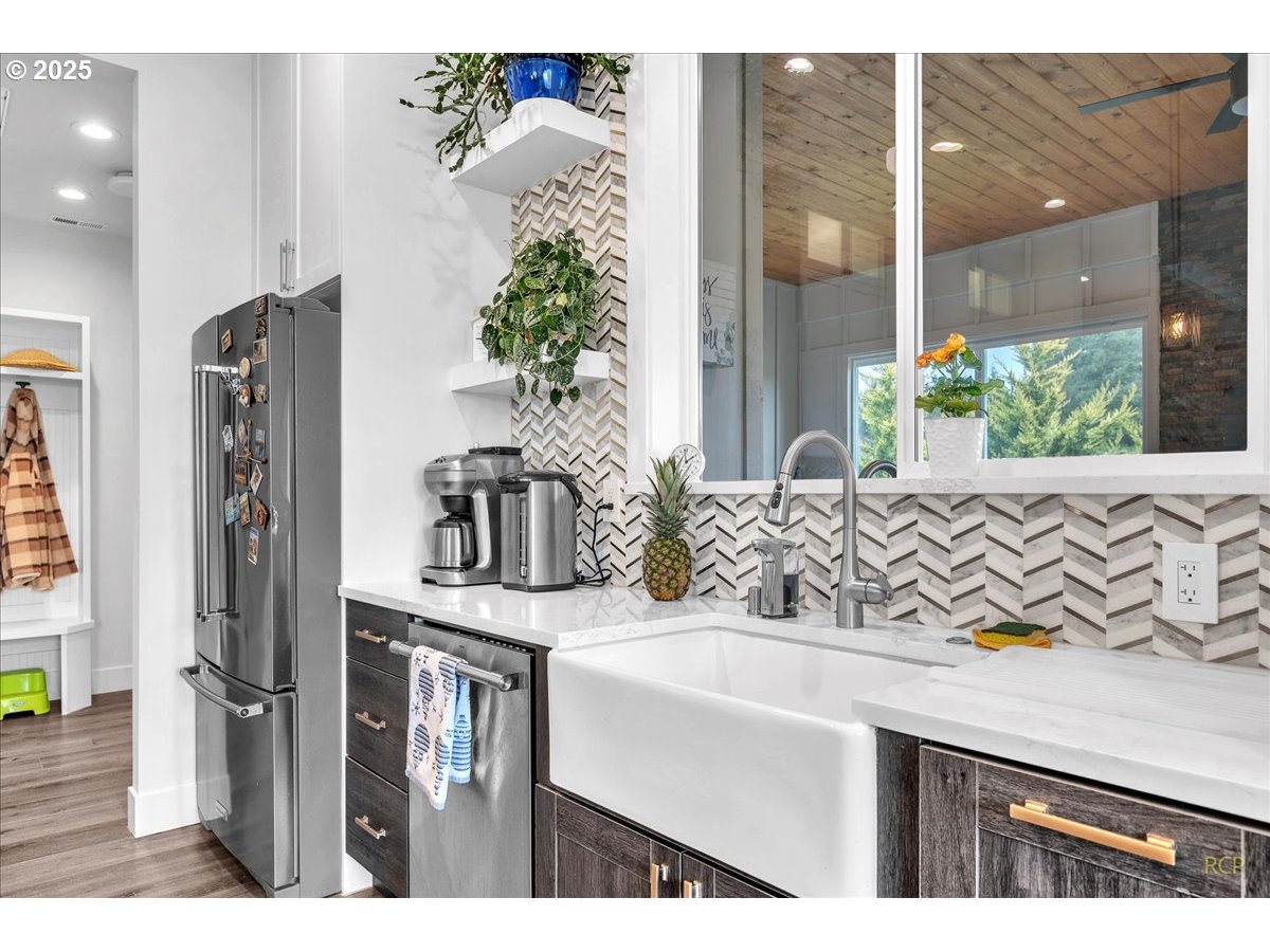 31001 Northwest 51st Avenue Ridgefield, WA 98642 - Photo 46 of 48 a bathroom with a sink and a mirror