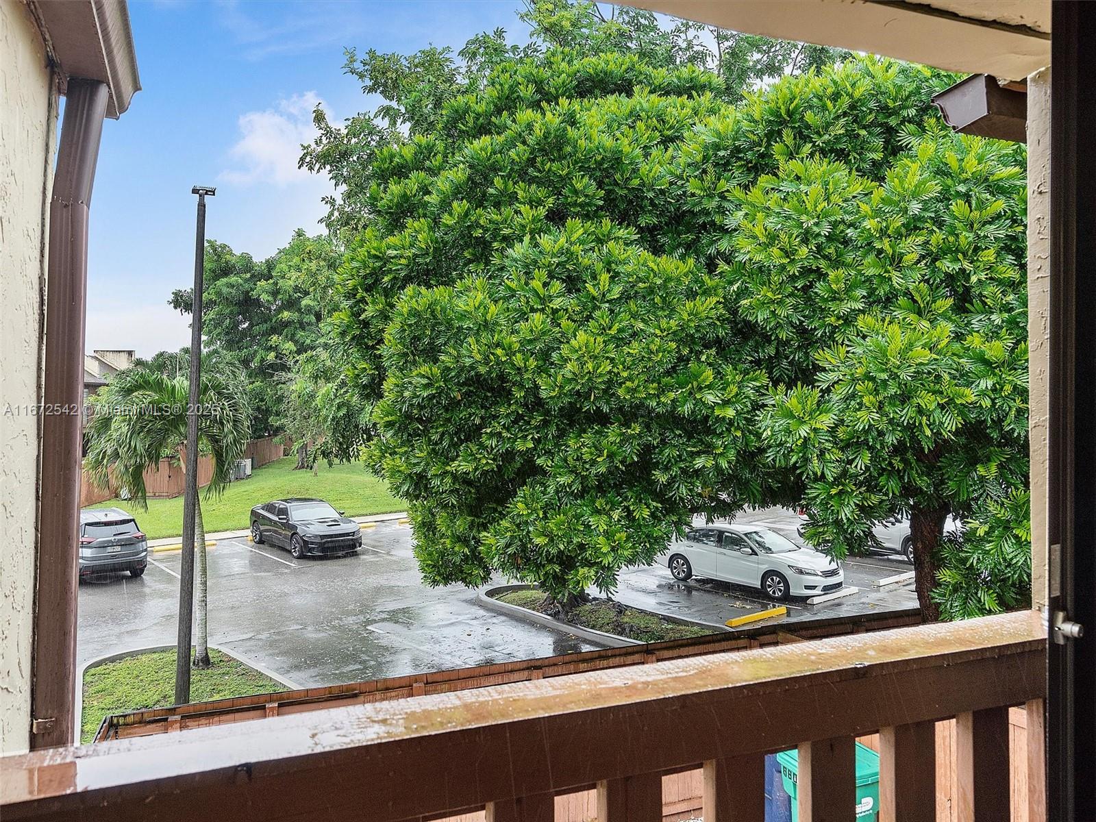 6604 Southwest 114th Place, Unit F72 Miami, FL 33173 - Photo 18 of 25 a view of a street with sitting area
