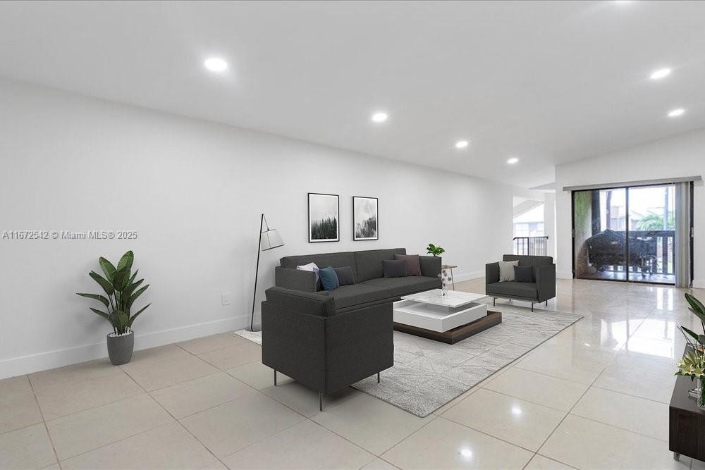 6604 Southwest 114th Place, Unit F72 Miami, FL 33173 - Photo 7 of 25 a living room with furniture and potted plant