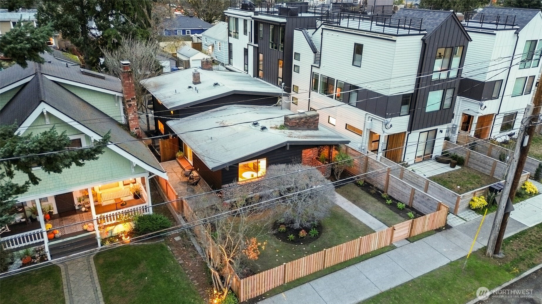 3209 61st Avenue Southwest Seattle, WA 98116 - Photo 28 of 32 an aerial view of a house with a yard