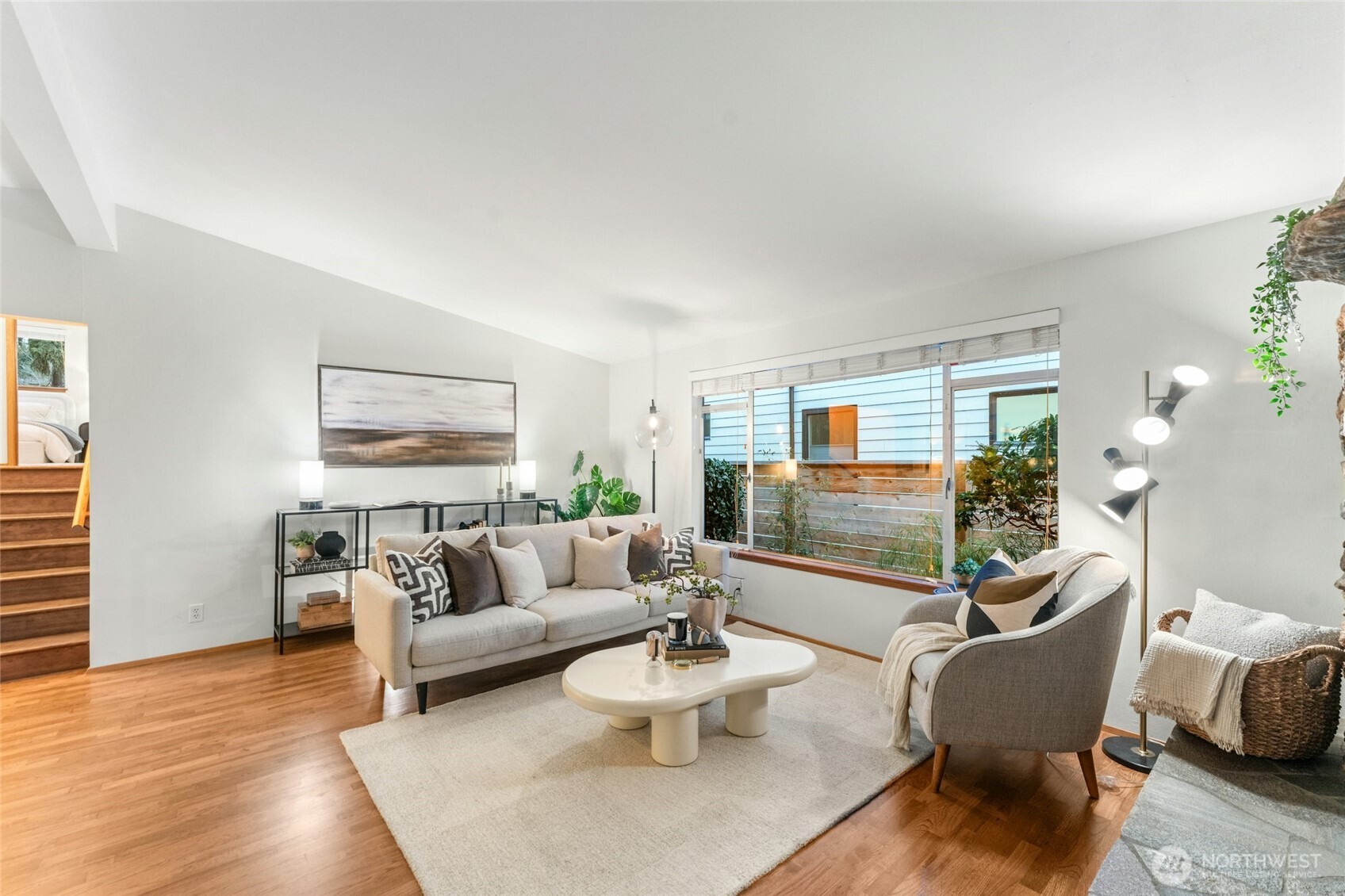 3209 61st Avenue Southwest Seattle, WA 98116 - Photo 4 of 32 a living room with furniture and a large window