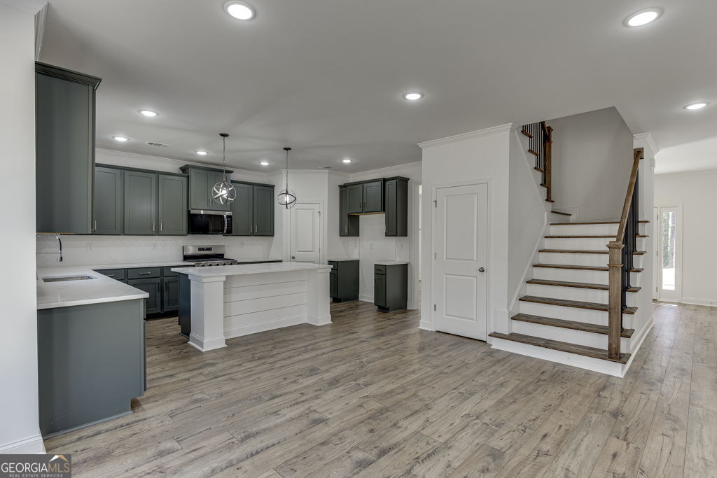 1003 Lakeview Drive Commerce, GA 30529 - Photo 15 of 48 a view of kitchen with cabinets and wooden floor