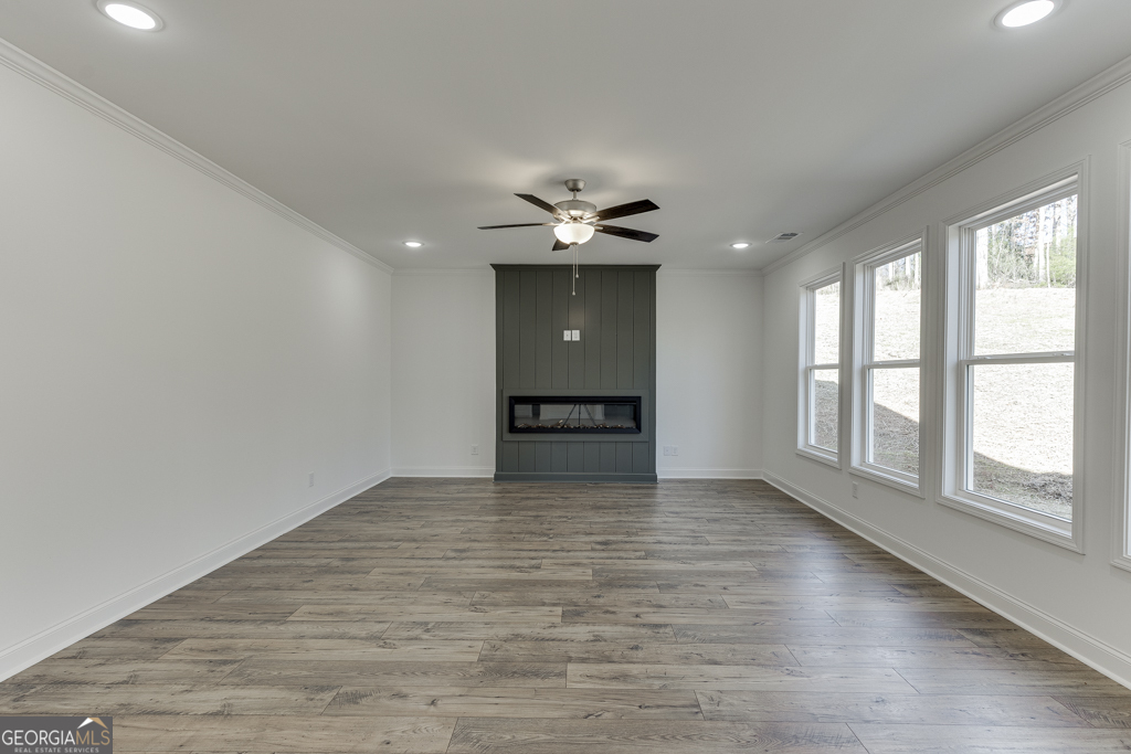 1003 Lakeview Drive Commerce, GA 30529 - Photo 17 of 48 wooden floor in an empty room with a window