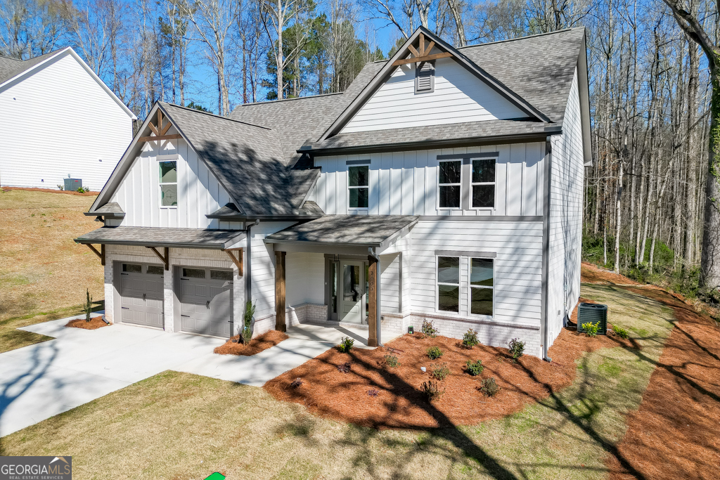 1003 Lakeview Drive Commerce, GA 30529 - Photo 2 of 48 a view of a house with large windows
