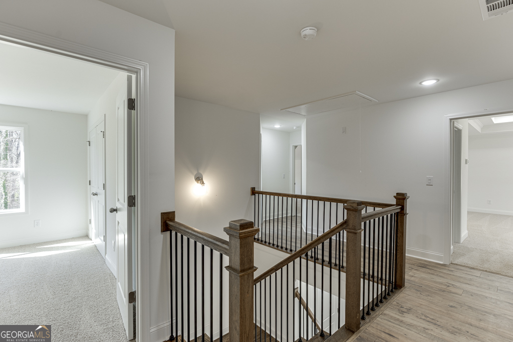 1003 Lakeview Drive Commerce, GA 30529 - Photo 22 of 48 a view of a hallway with windows and stairs