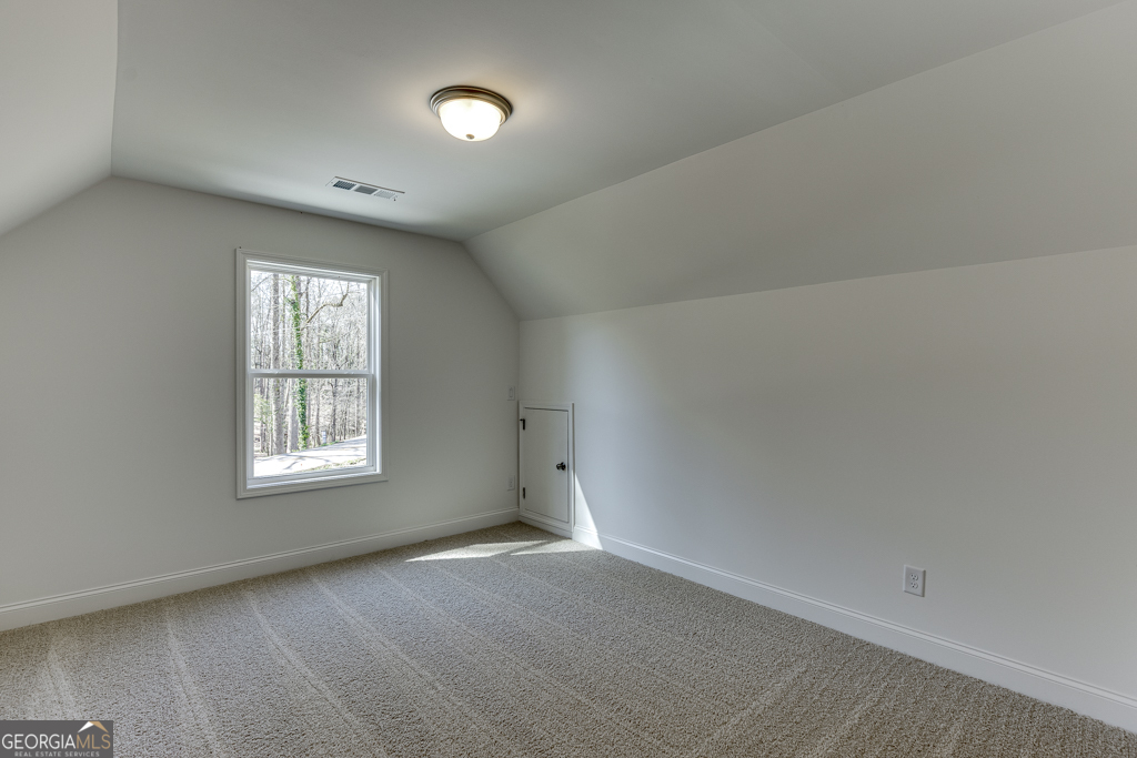 1003 Lakeview Drive Commerce, GA 30529 - Photo 28 of 48 an empty room with a window