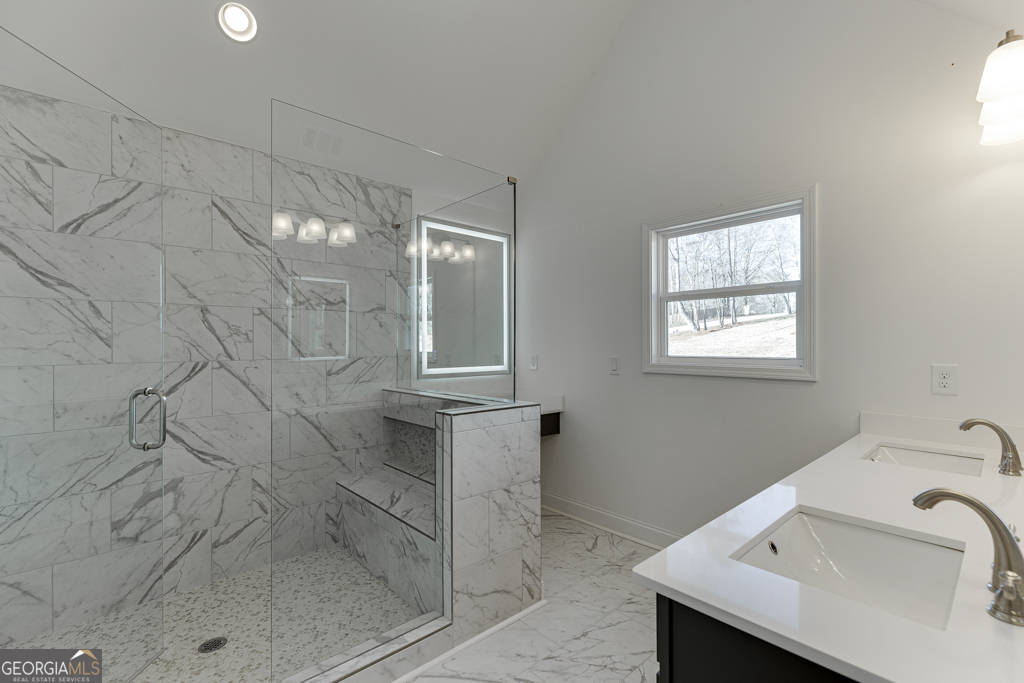 1003 Lakeview Drive Commerce, GA 30529 - Photo 37 of 48 a bathroom with a sink and mirror
