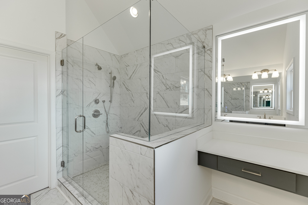 1003 Lakeview Drive Commerce, GA 30529 - Photo 39 of 48 a bathroom with a shower and mirror