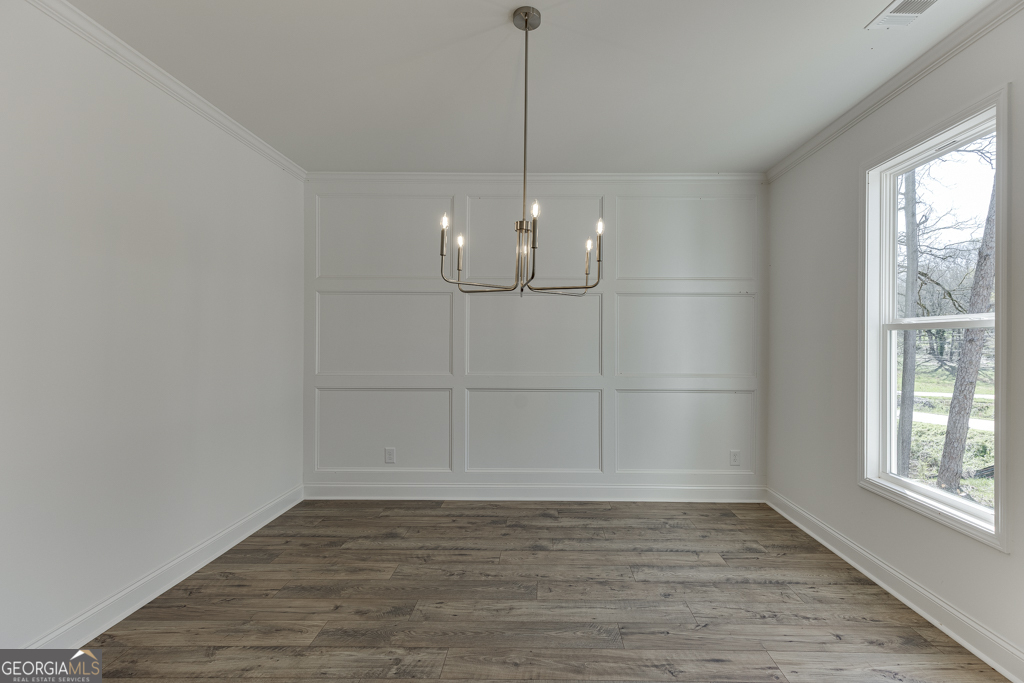 1003 Lakeview Drive Commerce, GA 30529 - Photo 5 of 48 a view of a room with window and wooden floor