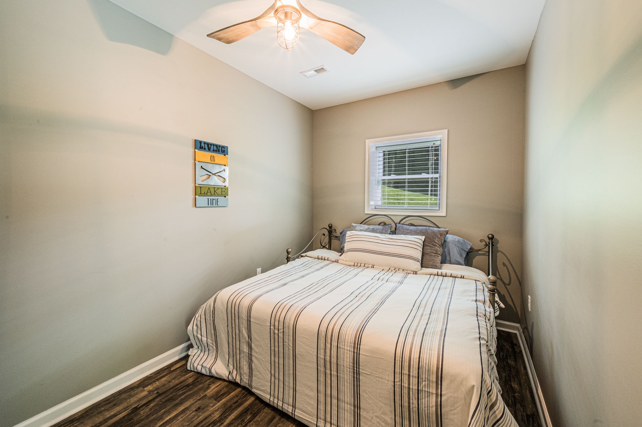 87 Angela Way Lewisburg, KY 42256 - Photo 23 of 39 a bedroom with a bed and painting on the wall