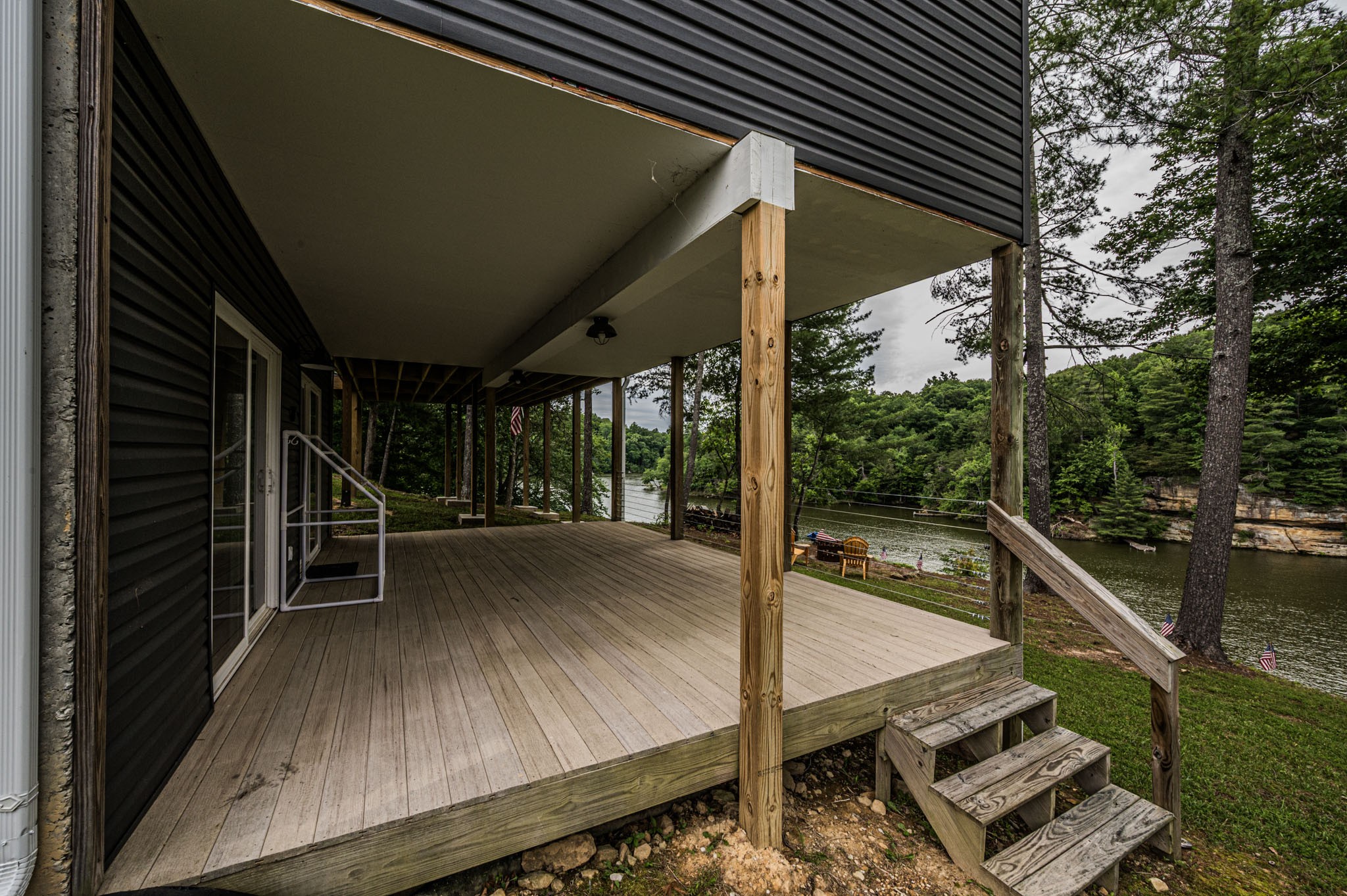 87 Angela Way Lewisburg, KY 42256 - Photo 32 of 39 a view of a balcony with floor to ceiling windows with wooden floor
