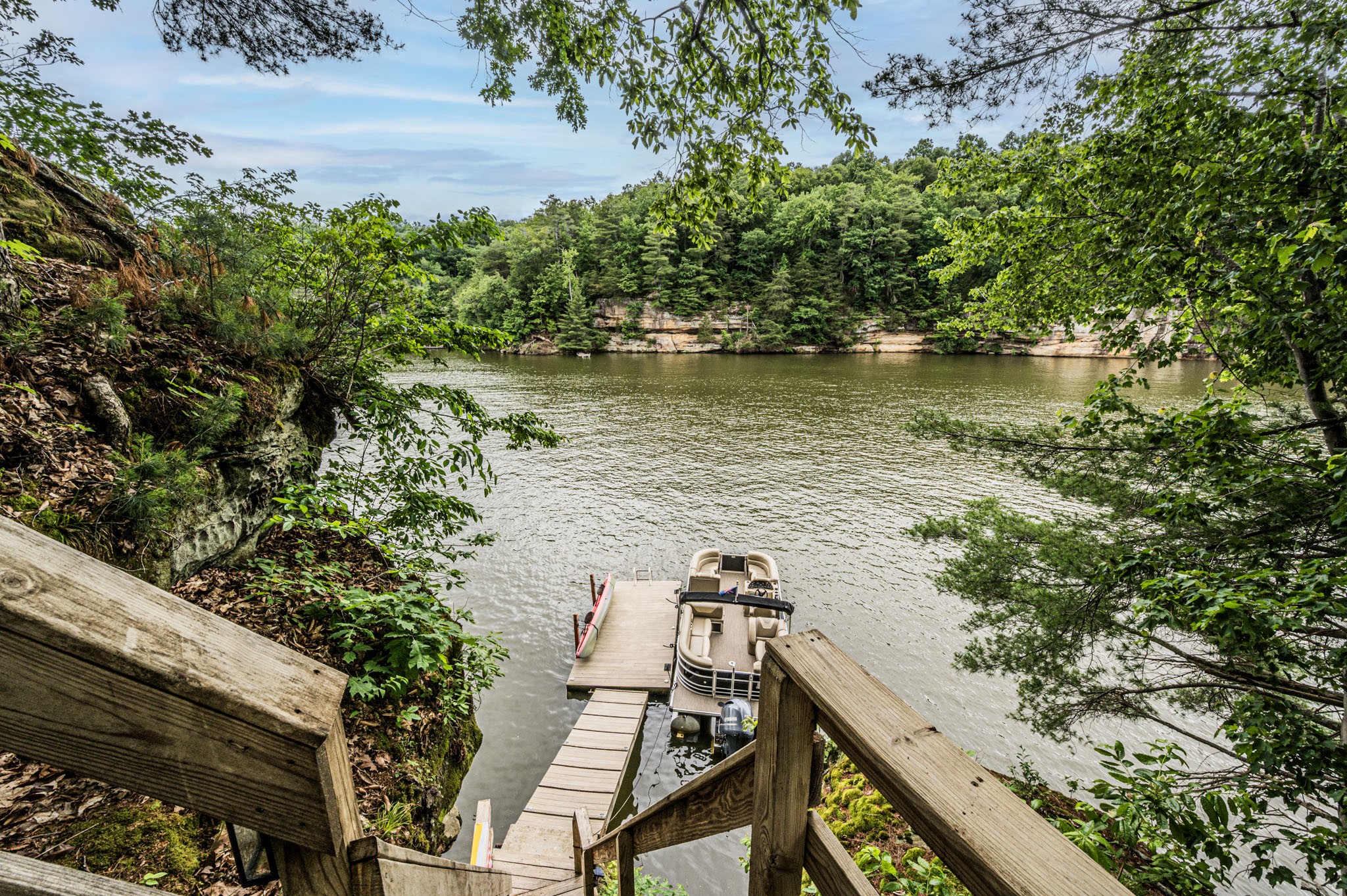 87 Angela Way Lewisburg, KY 42256 - Photo 35 of 39 a view of a wooden deck with a lake