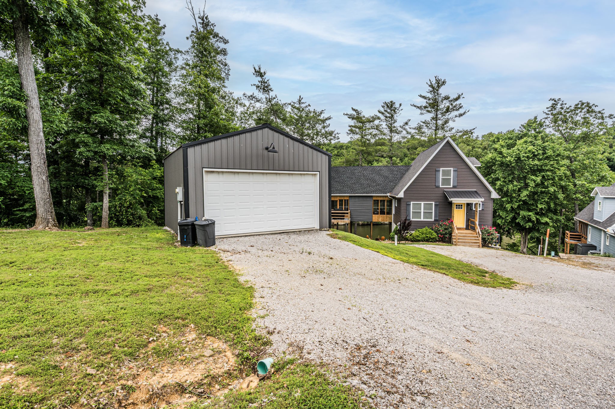87 Angela Way Lewisburg, KY 42256 - Photo 6 of 39 a front view of a house with a yard and garage