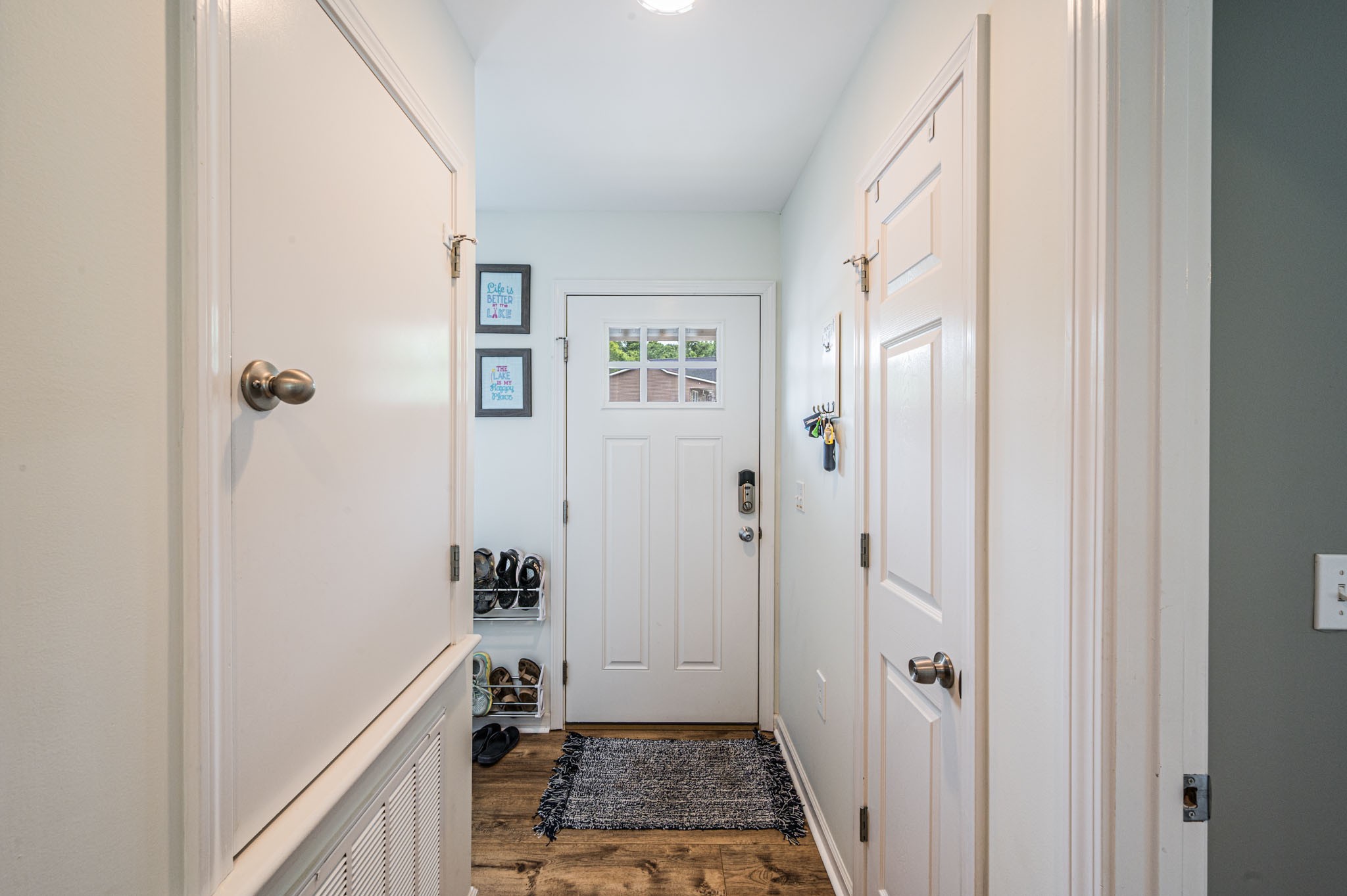 87 Angela Way Lewisburg, KY 42256 - Photo 7 of 39 a view of a hallway with white walls and a window