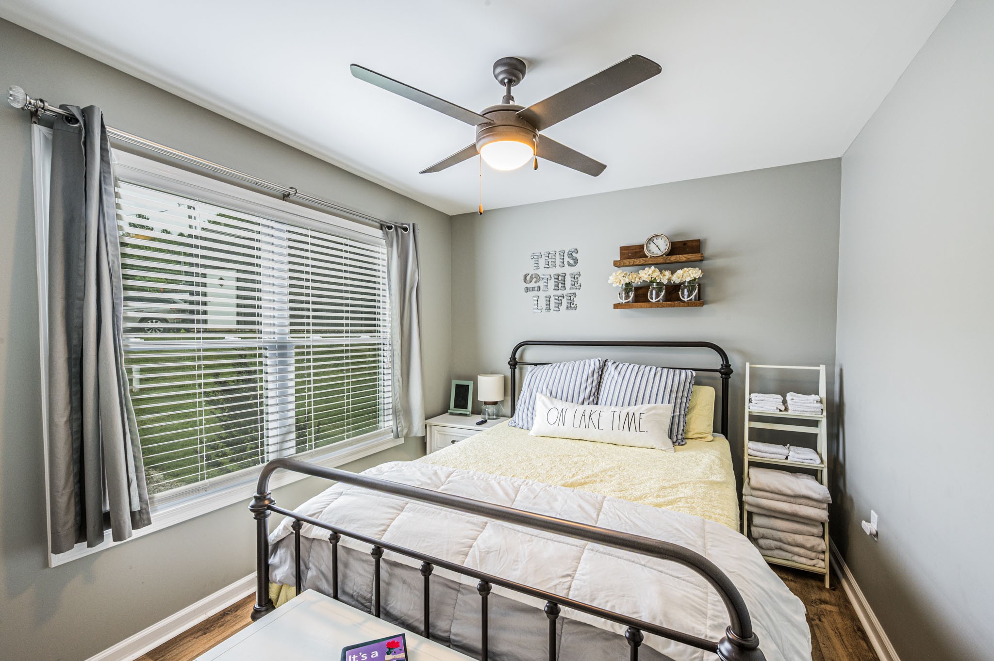 87 Angela Way Lewisburg, KY 42256 - Photo 8 of 39 a bedroom with a large bed and a chandelier