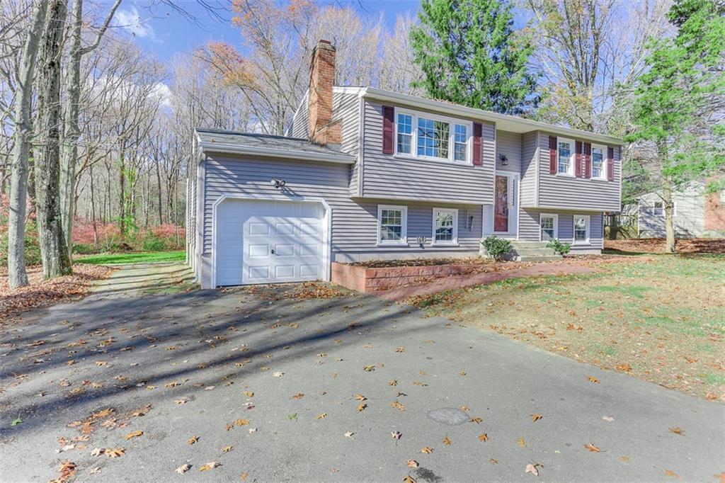 49 Long Hill Road Clinton, CT 06413 - Photo 1 of 1 a front view of a house with a yard