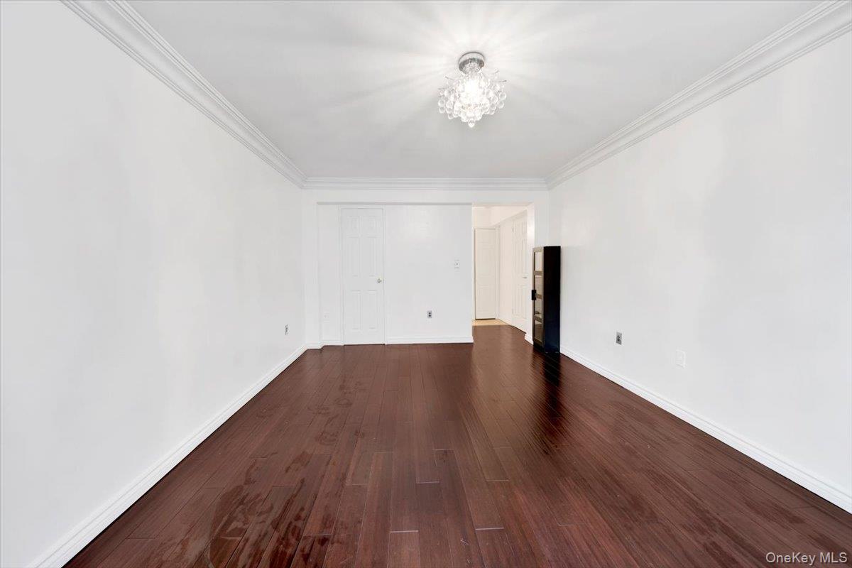 1 Balint Drive, Unit 366 Yonkers, NY 10710 - Photo 21 of 31 a view of a room with wooden floor and ceiling fan