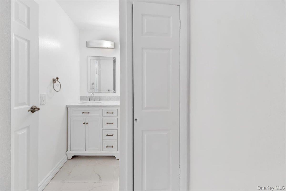1 Balint Drive, Unit 366 Yonkers, NY 10710 - Photo 25 of 31 a view of a bathroom with a sink