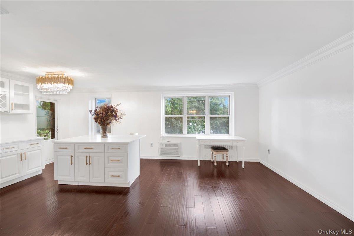 1 Balint Drive, Unit 366 Yonkers, NY 10710 - Photo 8 of 31 a living room with furniture and a wooden floor