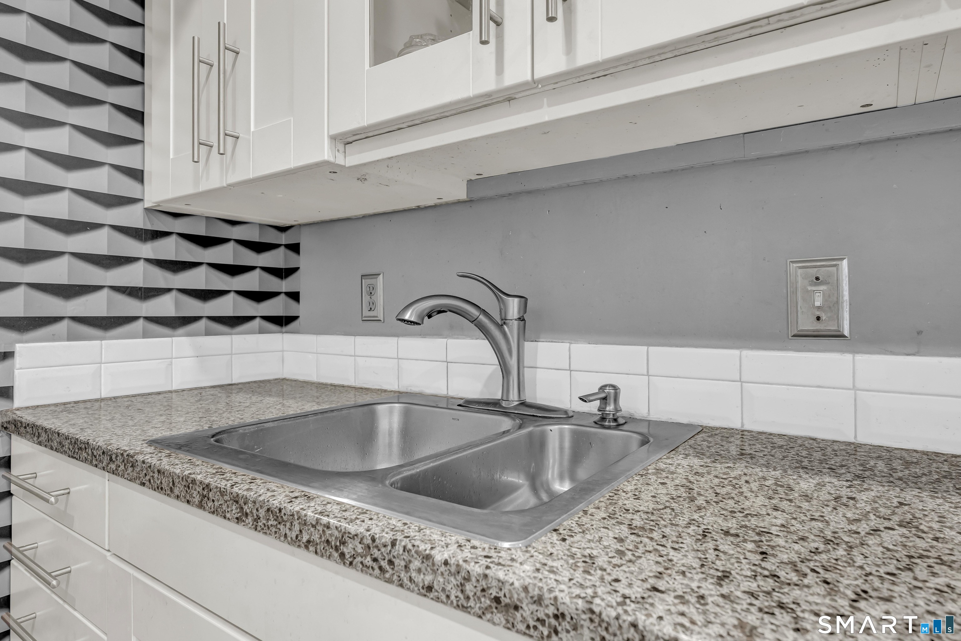 14 Newtown Road, Unit A5 Danbury, CT 06810 - Photo 14 of 27 a close view of sink and tap