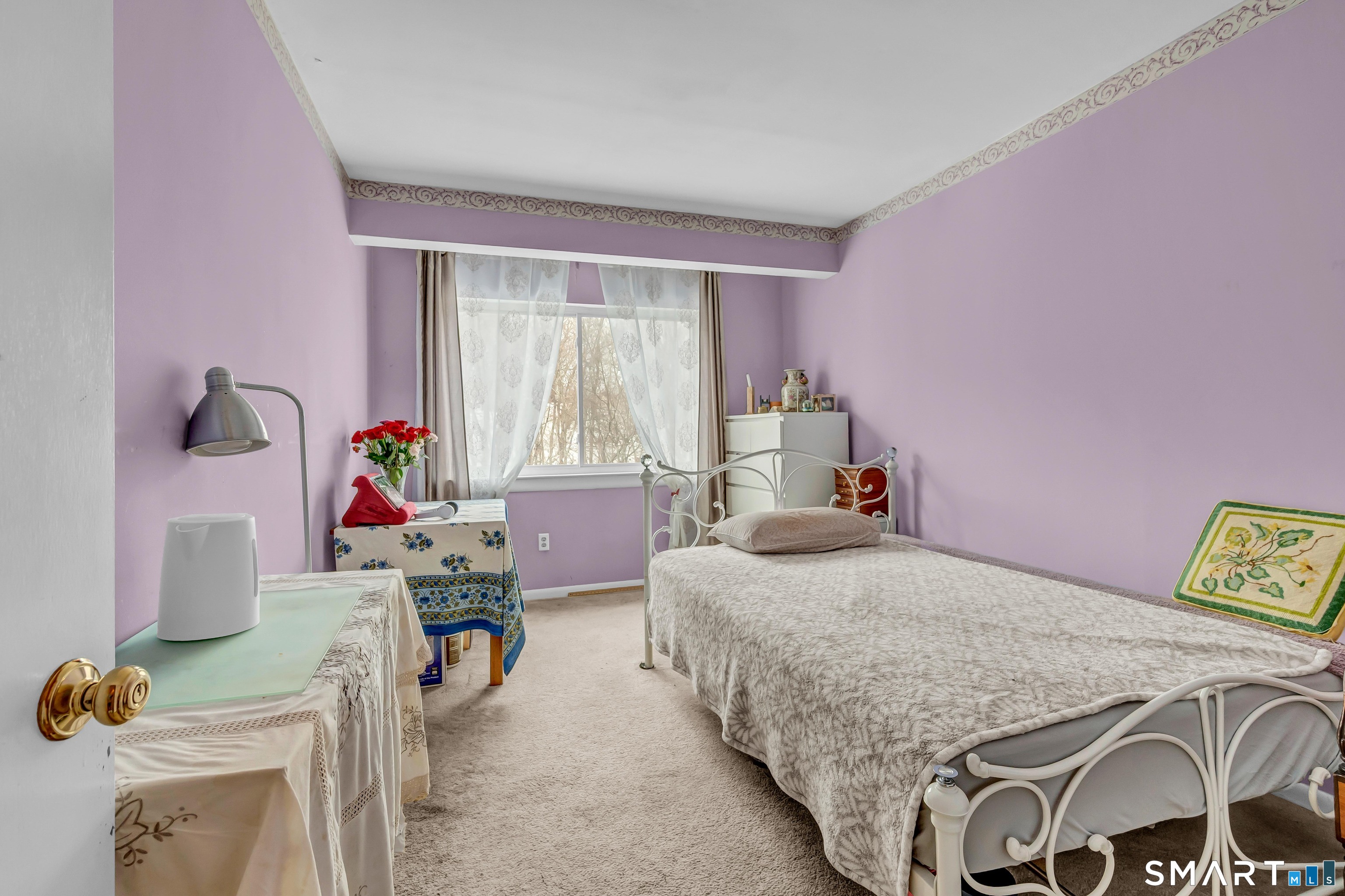 14 Newtown Road, Unit A5 Danbury, CT 06810 - Photo 19 of 27 a bedroom with a bed and a table