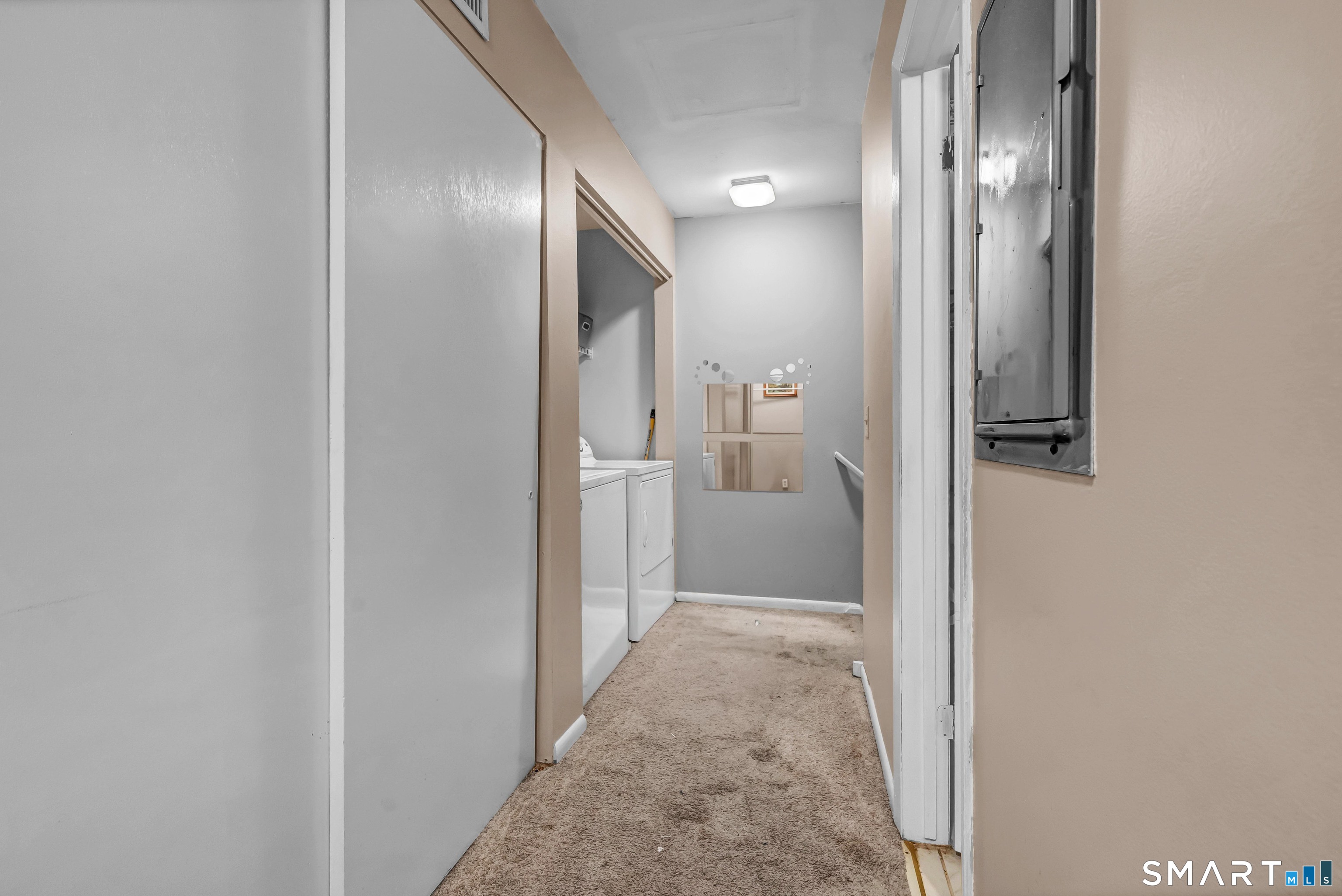 14 Newtown Road, Unit A5 Danbury, CT 06810 - Photo 23 of 27 a view of a hallway with wooden floor