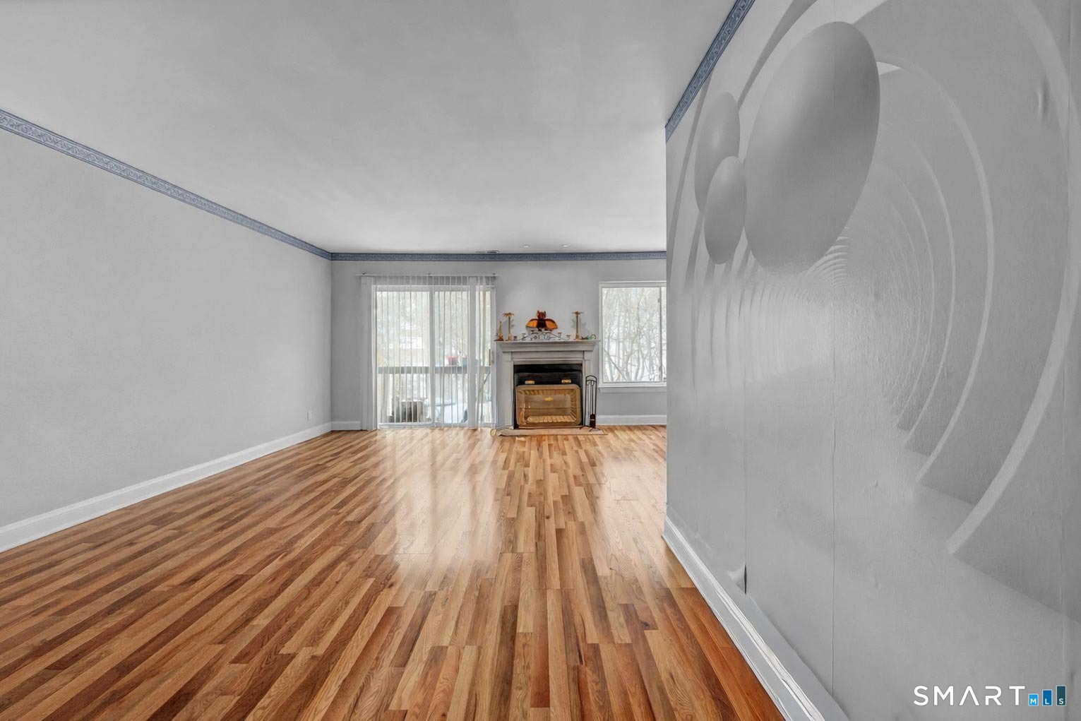 14 Newtown Road, Unit A5 Danbury, CT 06810 - Photo 3 of 27 a view of a room with wooden floor and staircase